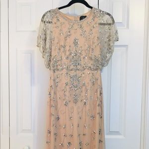 Adrianna Papell beaded gown with flutter sleeves